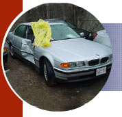 A damaged car before Felix Auto Body